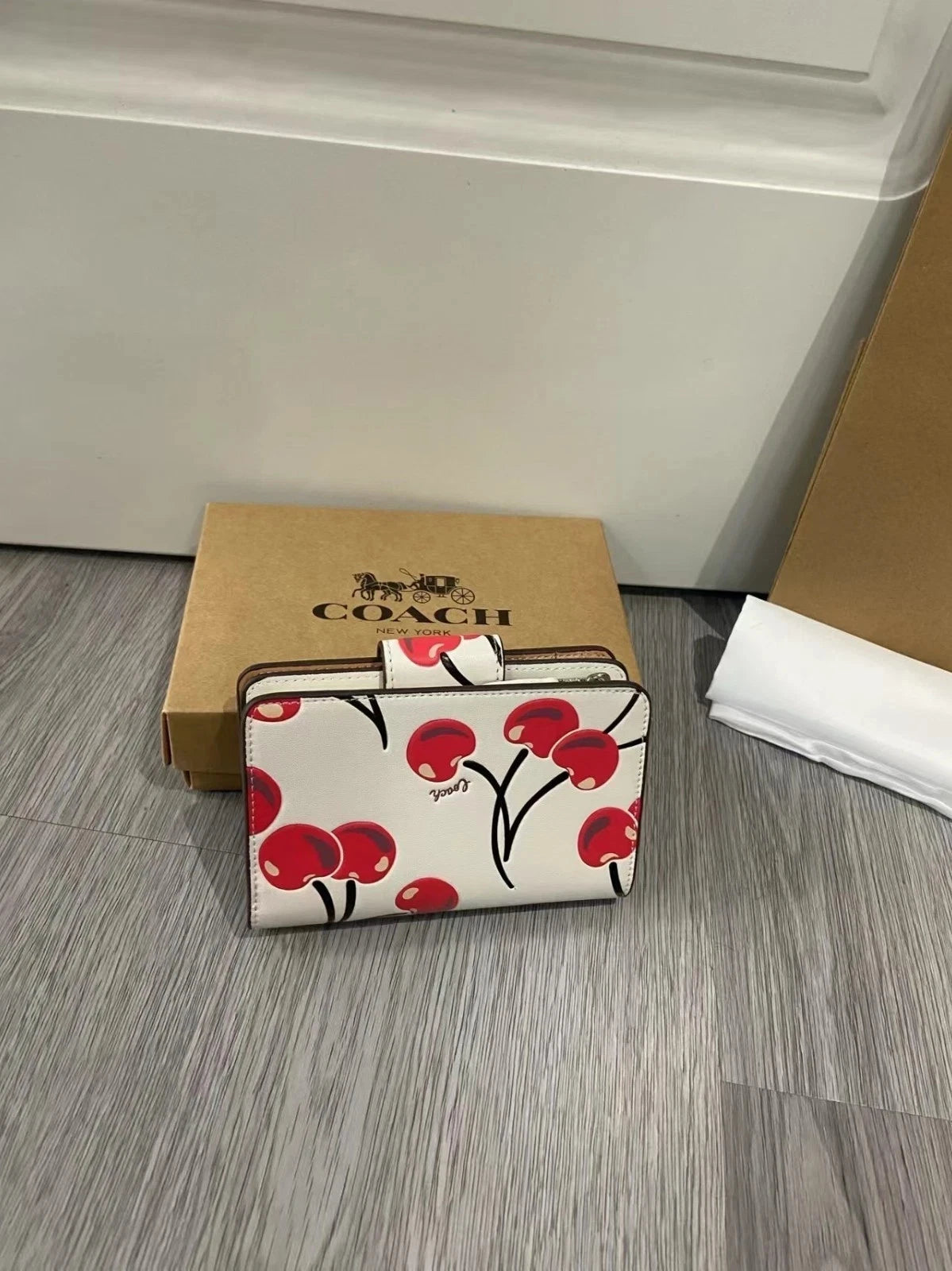 Coach Cherry Print Wallet – White with Red Cherries and Gold-Tone Logo