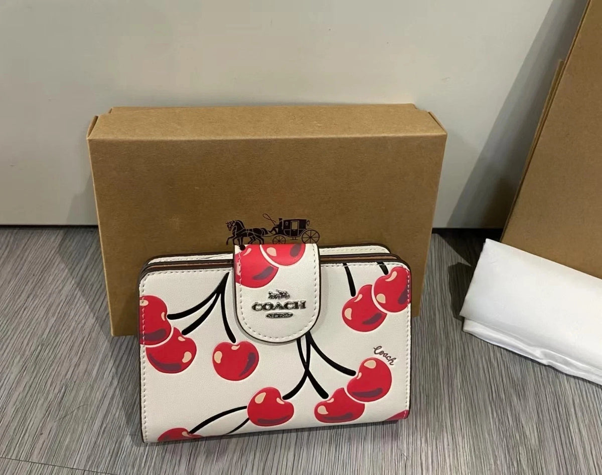 Coach Cherry Print Wallet – White with Red Cherries and Gold-Tone Logo